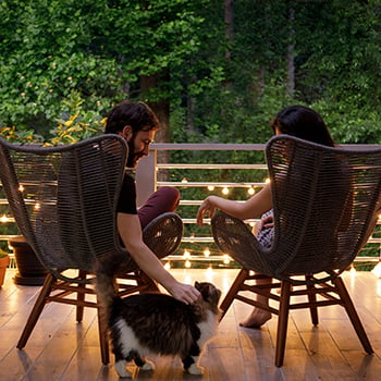 couple sitting on patio at home