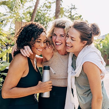 three women hugging