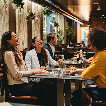 couple smiling while grocery shopping
