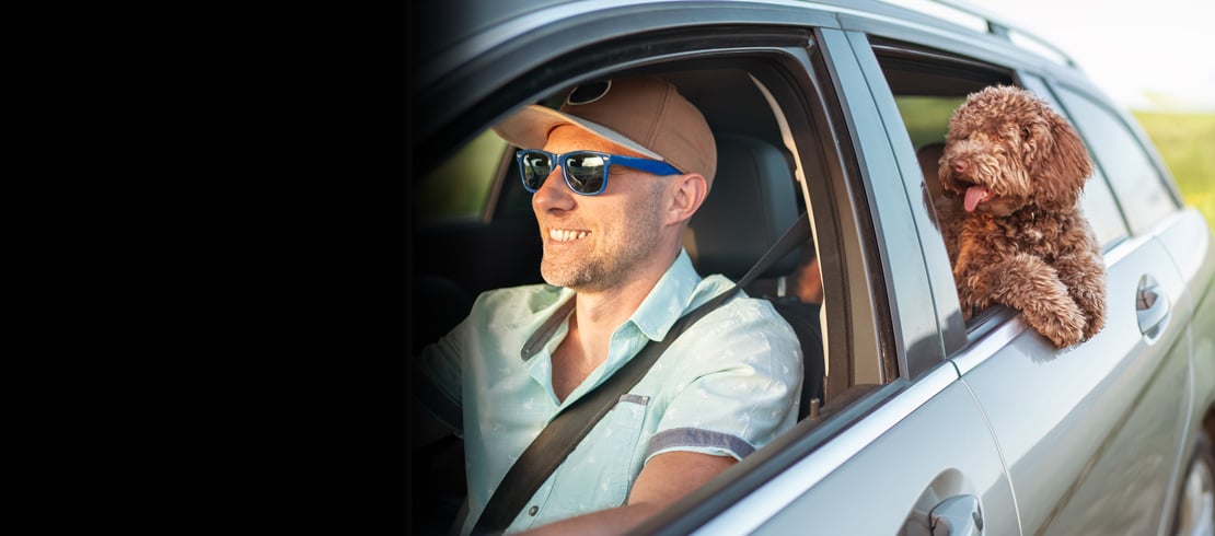 man in car after getting car loan from Delta Community Credit Union man in car after getting car loan from Delta Community Credit Union