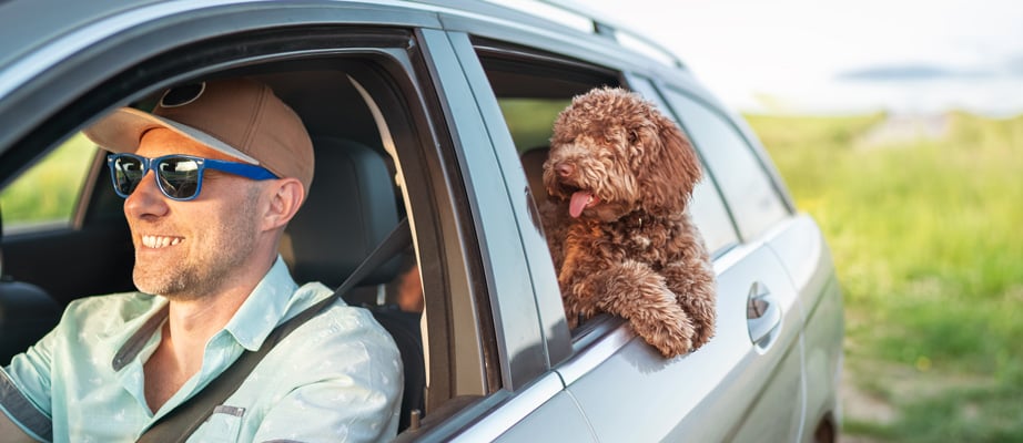 man in car after getting car loan from Delta Community Credit Union man in car after getting car loan from Delta Community Credit Union