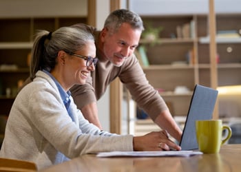 couple looking at laptop
