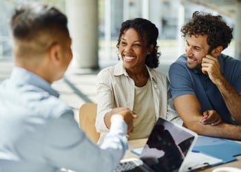 man and woman closing on a deal