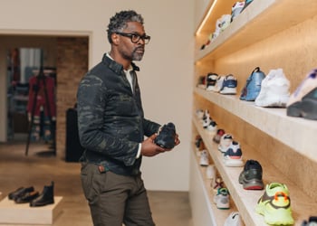 man shopping for shoes
