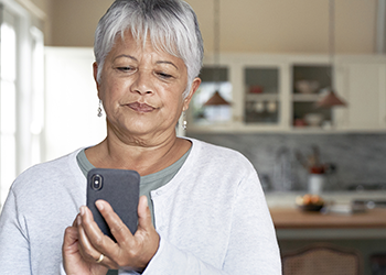 woman looking at phone