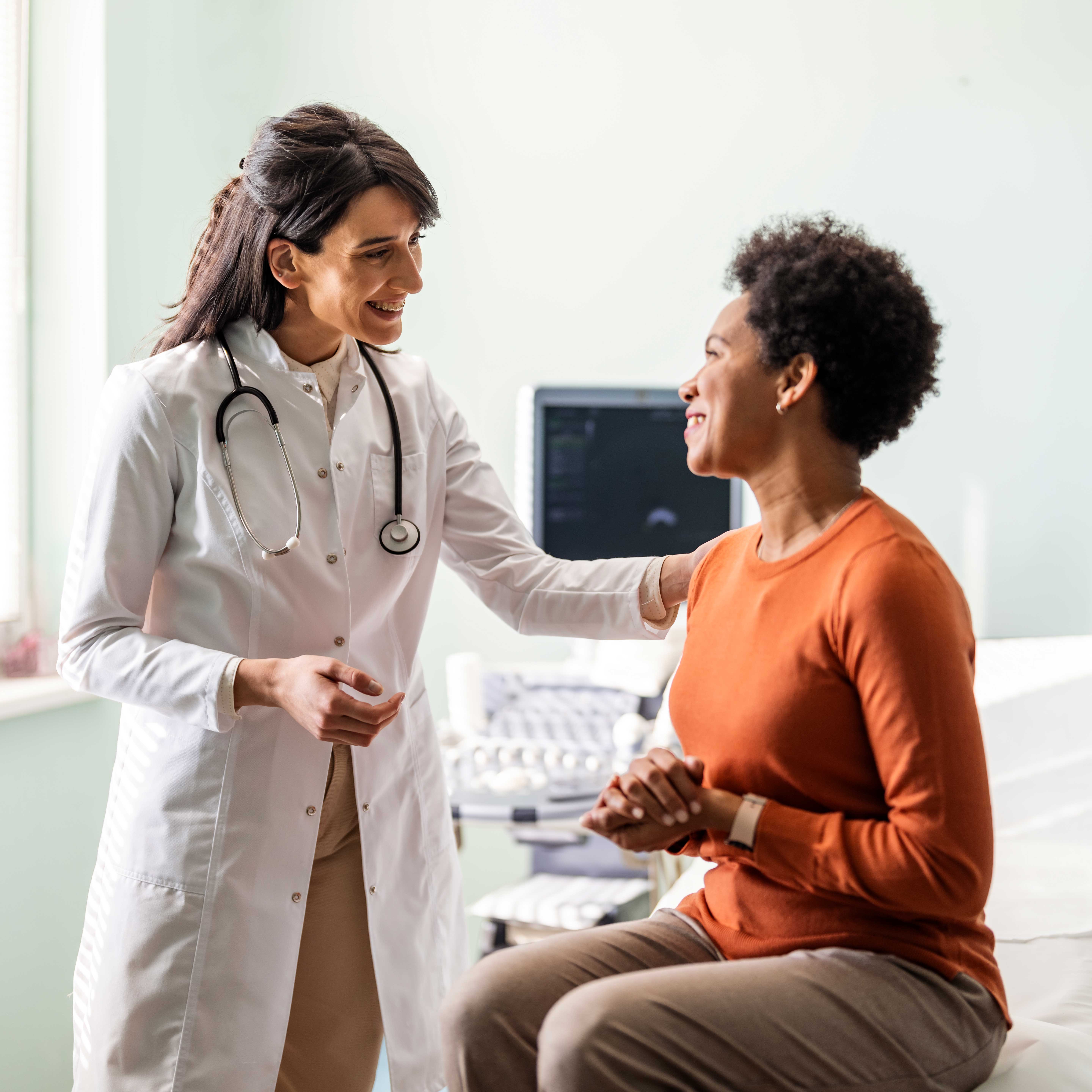 doctor and patient smiling