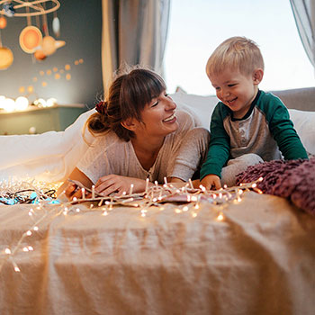 woman and young son laughing