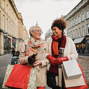 two friends holiday shopping