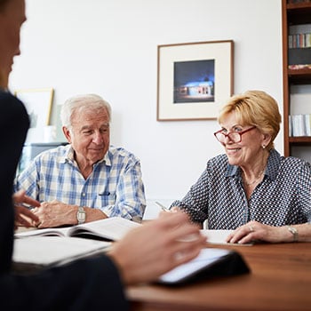 couple with financial advisor