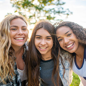 teenage girls smiling