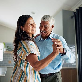 couple smiling and dancing